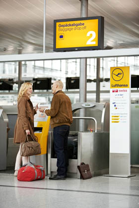 Lufthansa passengers using self bag drop