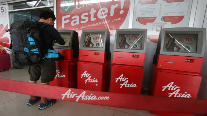 Air Asia now self-service check-in only at Kuala Lumpur