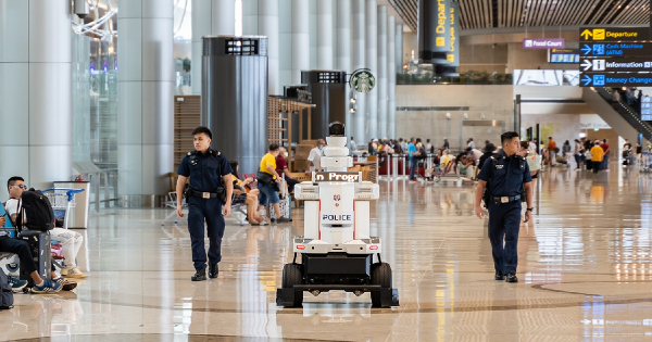 Changi Airport police robot and real police
