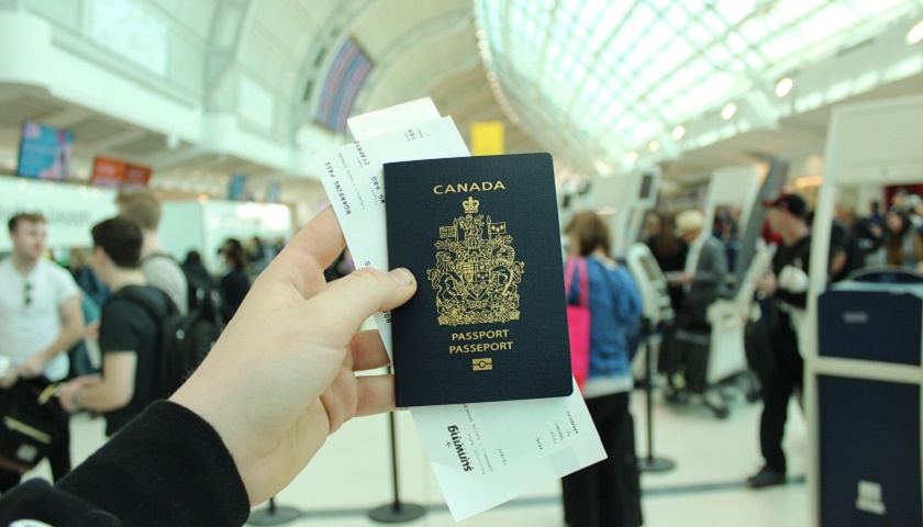 Person holding Canadian passport